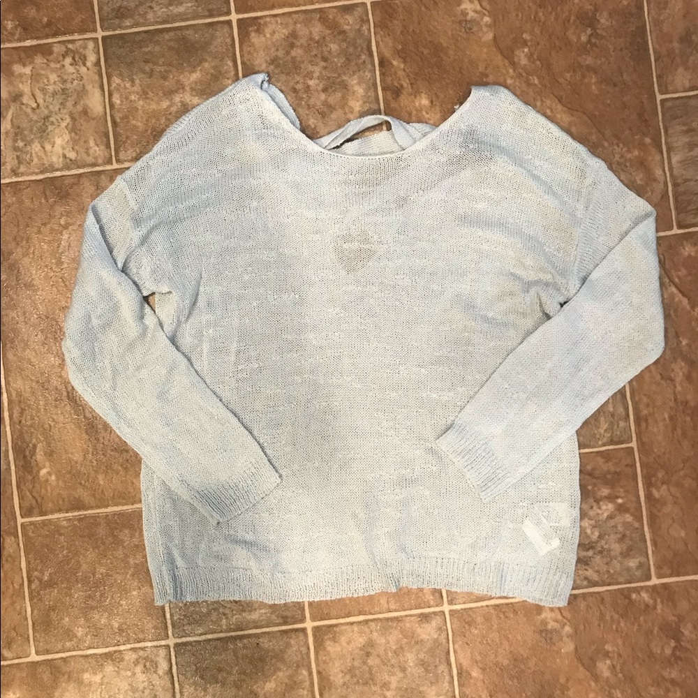 light blue sweater